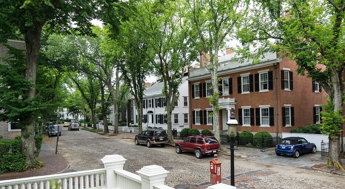 Nantucket's cobblestone Main Street lined with Federal-style buildings - a National Historic Landmark district